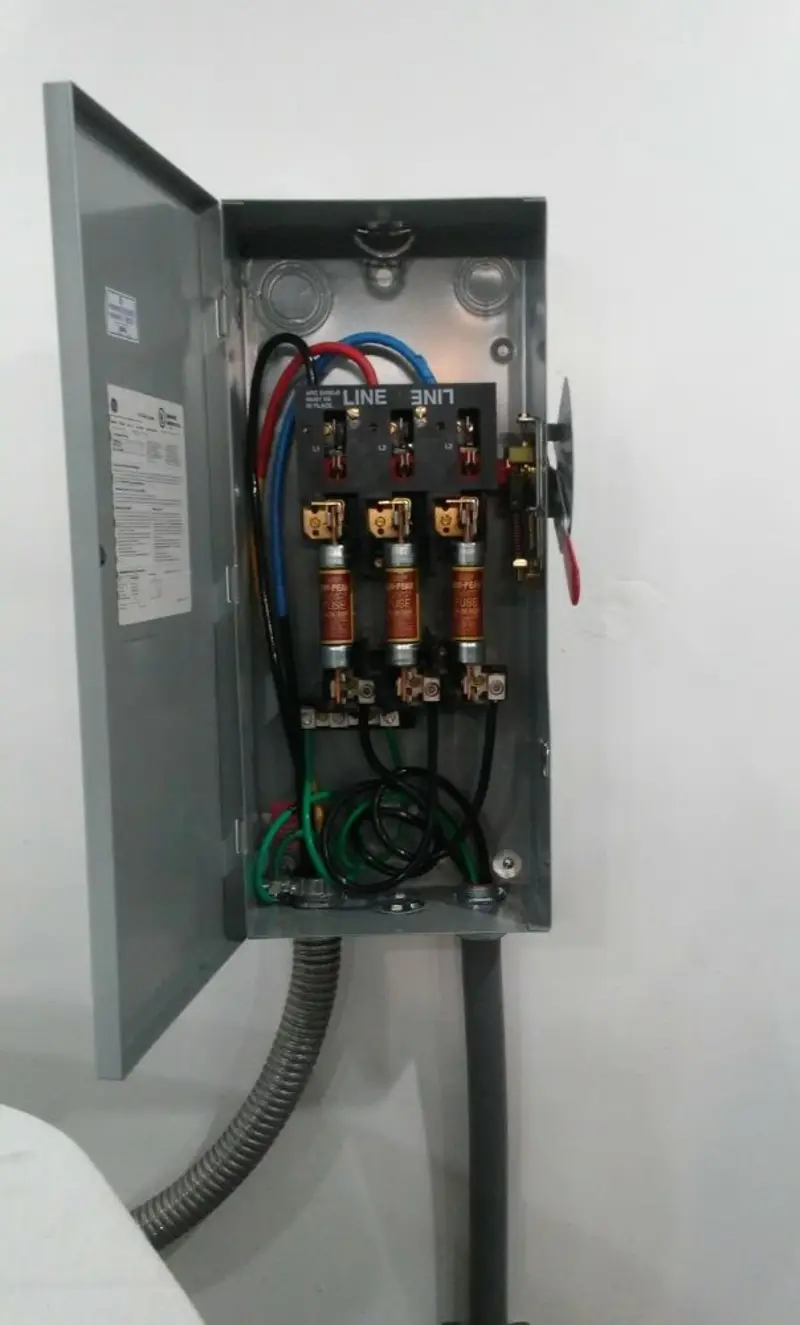 Three-phase disconnect switch installed for Smoke Detector Installation in Riley